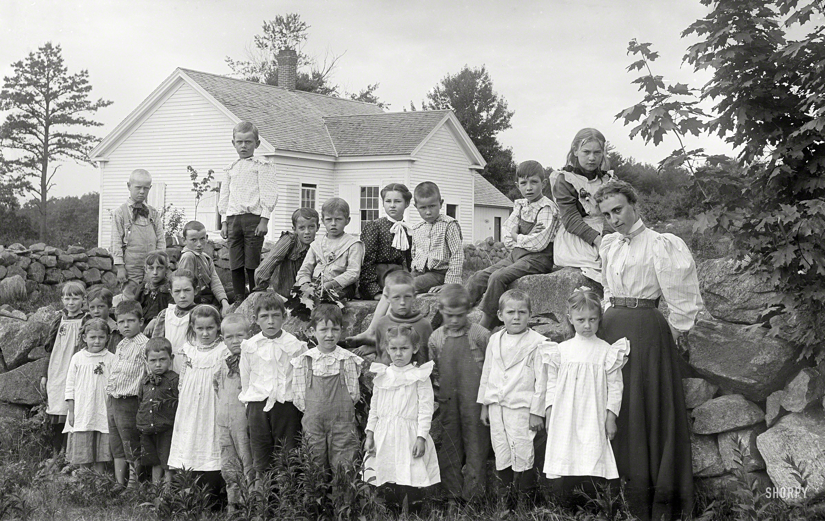 From the same circa 1900 batch of 5x8 glass negatives as Little Boy Blue we bring you more sullen moppets than you can shake a stick at. Which the tot in the middle is holding. Now, smile for your great-great grandchildren. View full size.