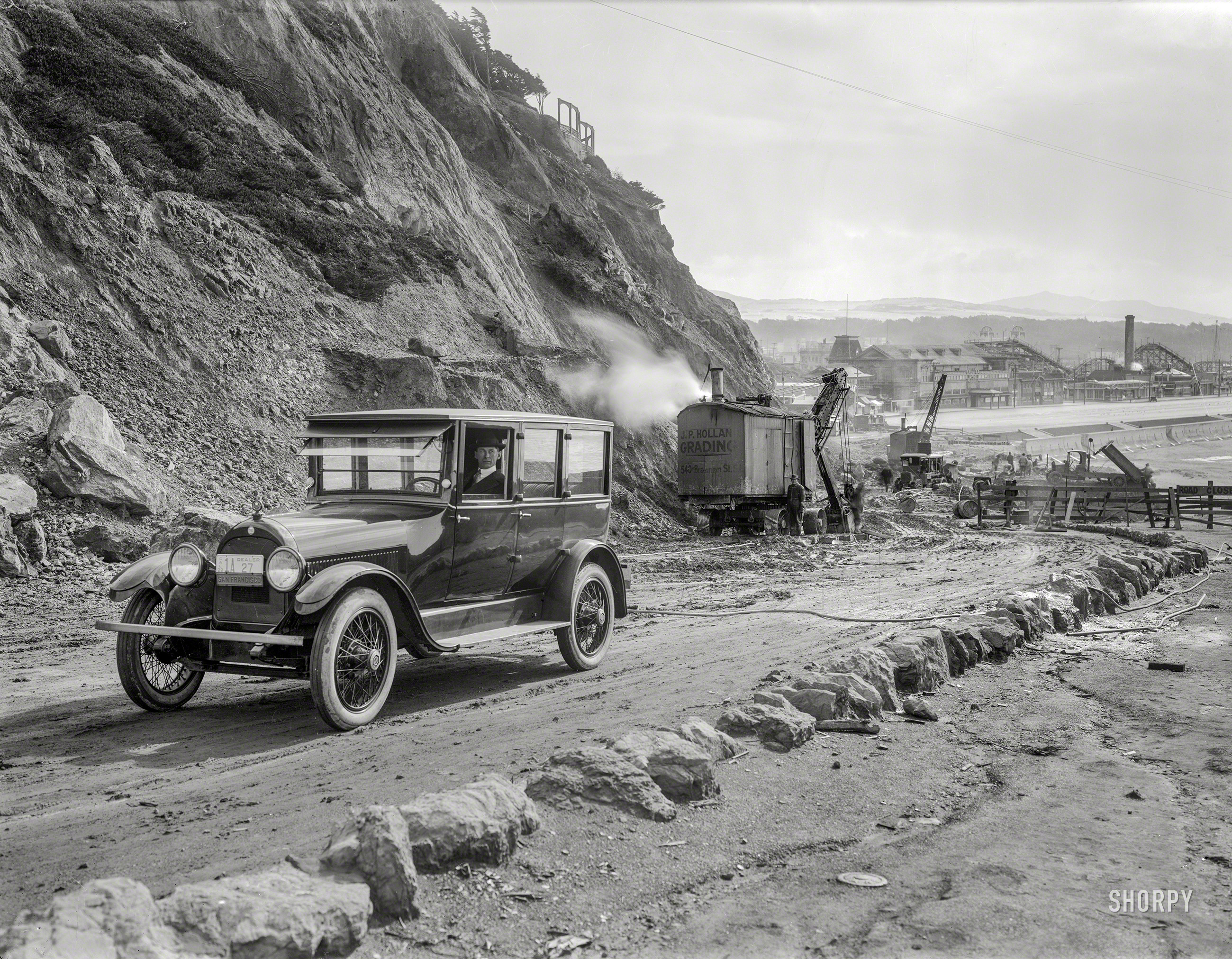 San Francisco, 1922. "Cliff House road construction, view of Sutro Heights and Playland amusement park." 6x8 inch glass negative. View full size.