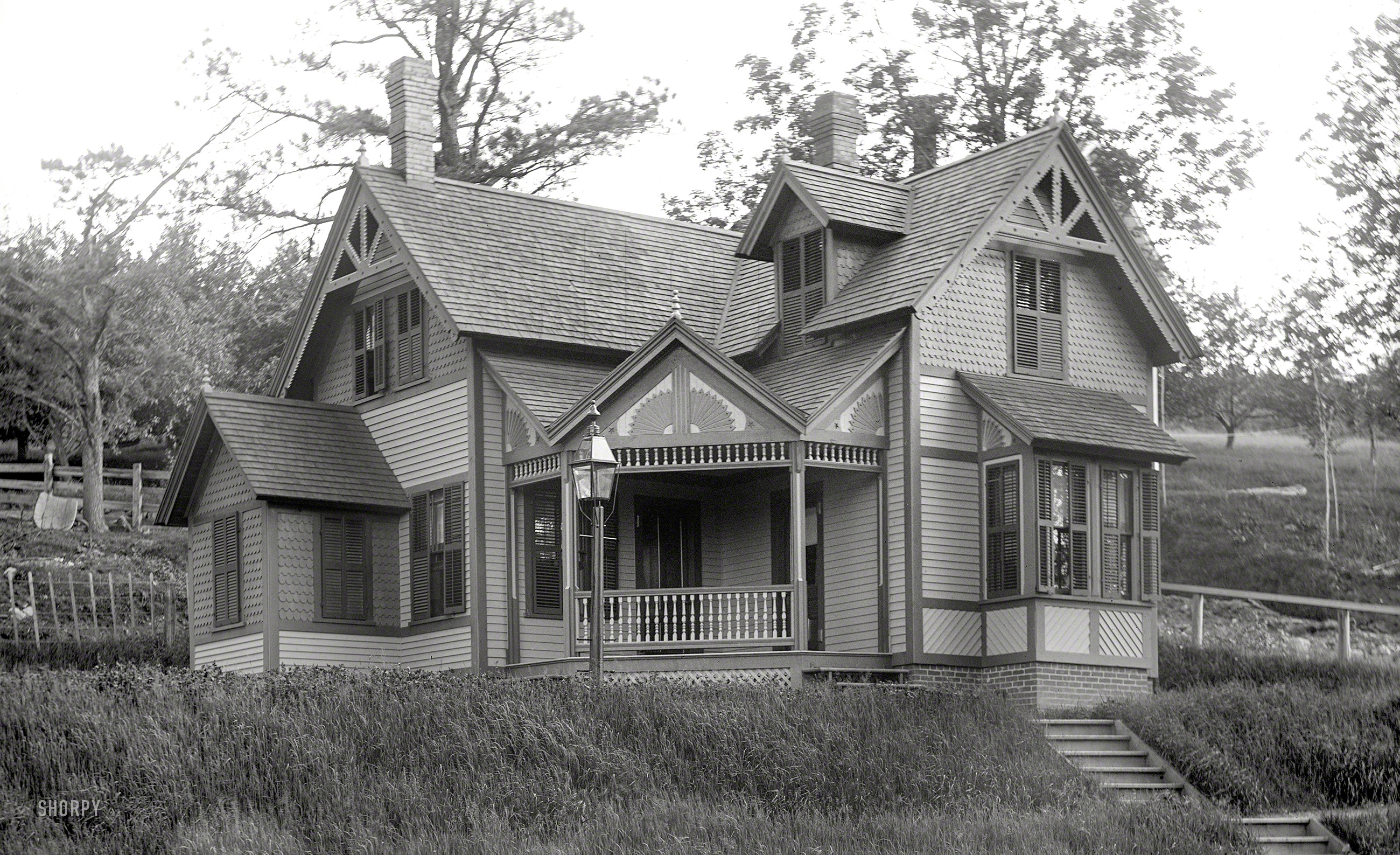 From around 1900 we bring you someone's new house in the vicinity of Stafford, Connecticut. Fancy millwork abounds! 5x8 glass negative. View full size.