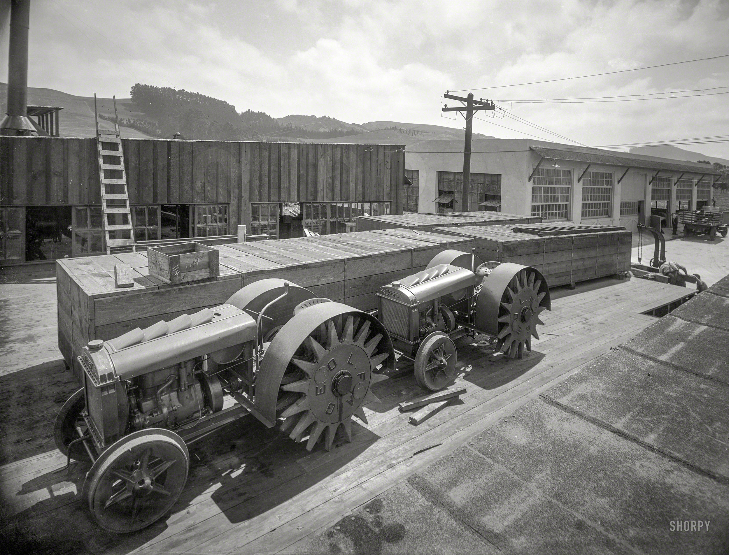 Oakland, 1918. "Crating Fageol 'walking tractors' at factory." Our first look at an unusual agricultural implement. 8x10 glass negative. View full size.