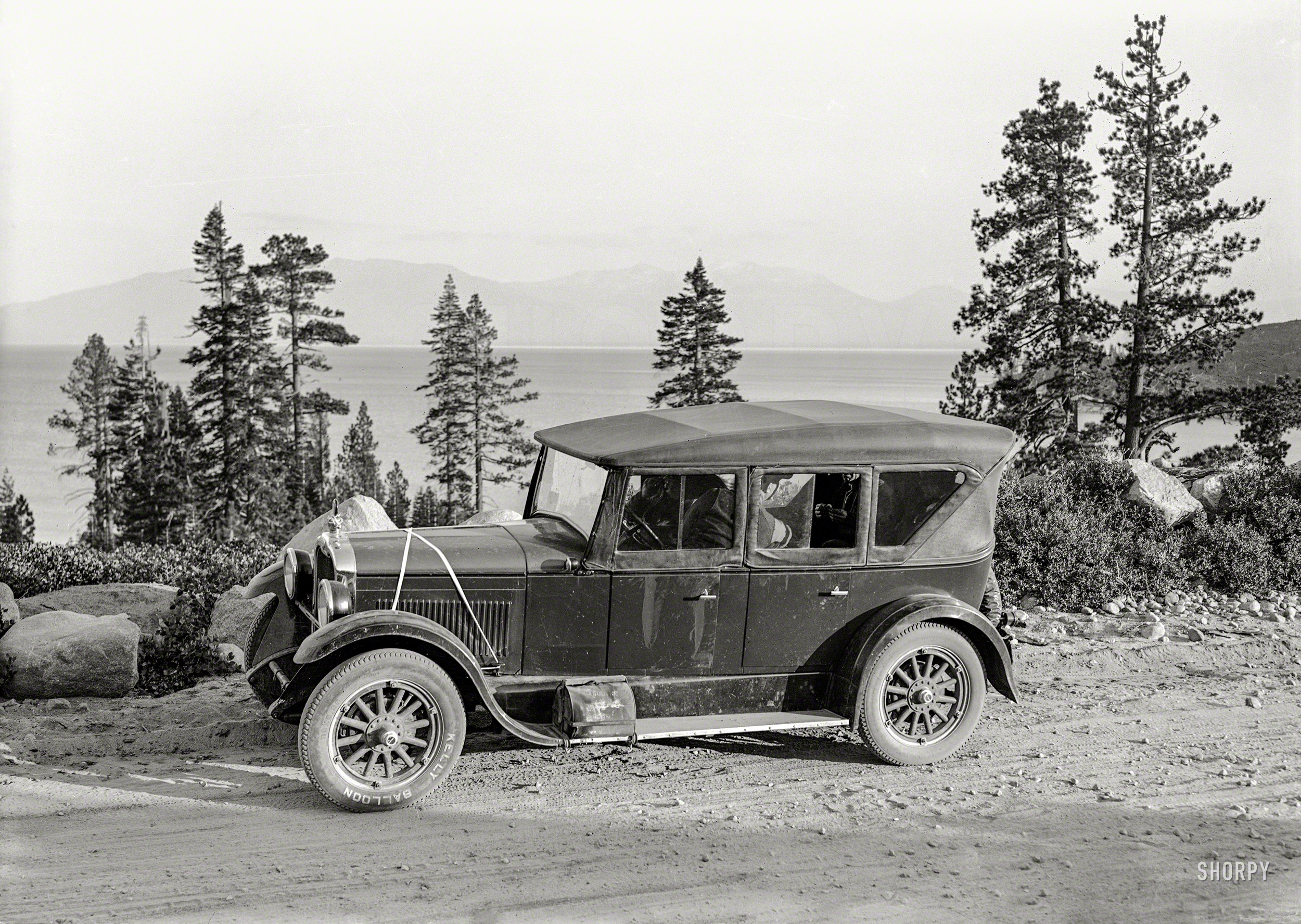 Circa 1923. "Peerless touring car at Lake Tahoe (California)." Rolling on Kelly Balloons. 5x7 glass negative by Christopher Helin. View full size.