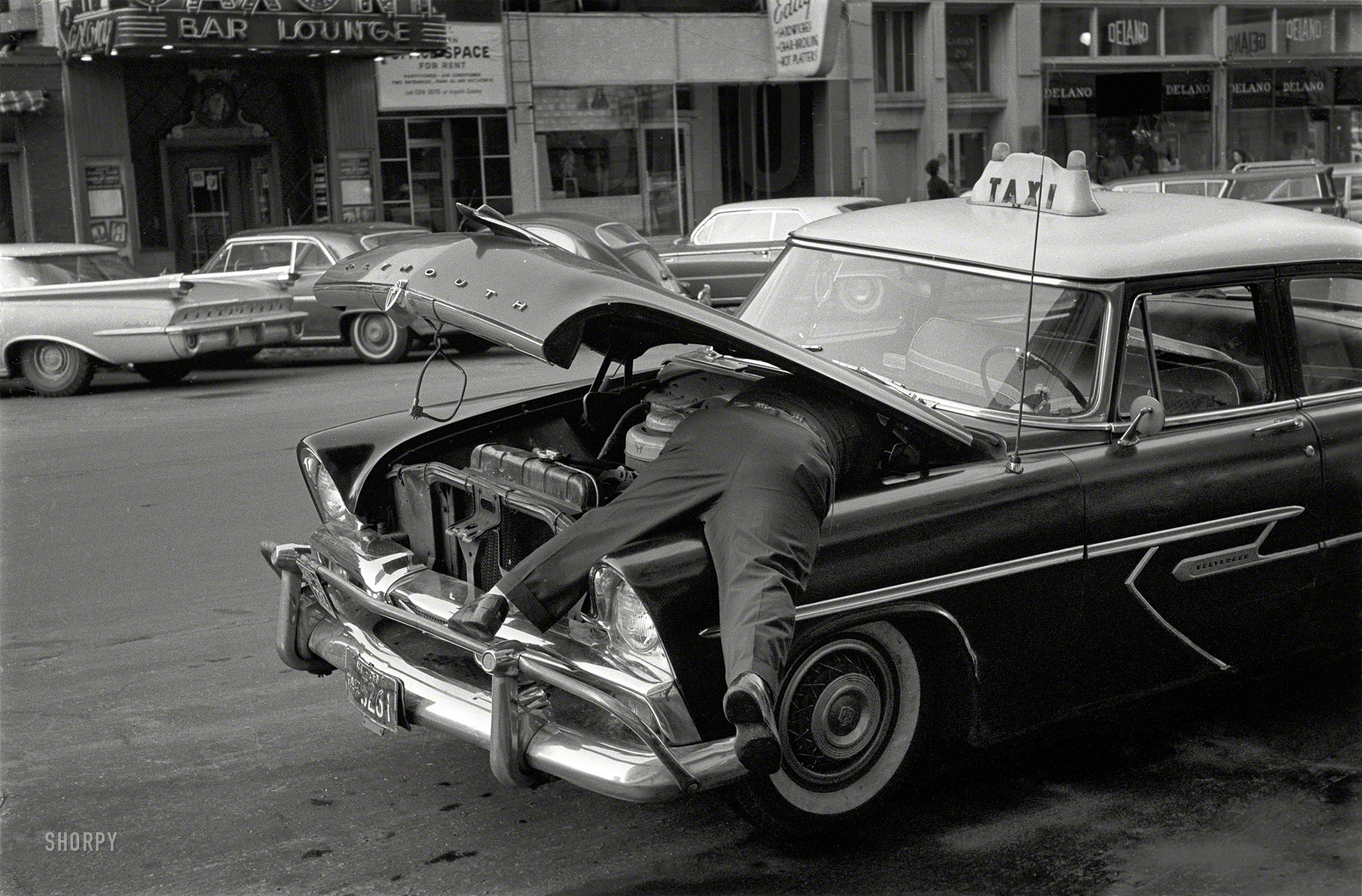 1963. "Cab driver and taxi at Saxony Bar & Lounge, Boston." 35mm negative, photographer unknown. Another eBay find scanned by Shorpy. View full size.