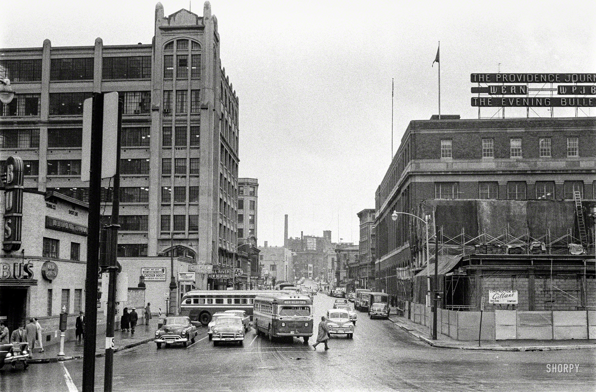 "Street scene, Providence, 1957." Featuring the New England Terminal Co. bus station, Chicken Roost restaurant and Journal-Bulletin newspaper building. 35mm negative, photographer unknown. View full size.
