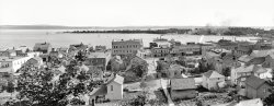 Michigan circa 1906. "Harbor Springs and Harbor Point, Little Traverse Bay." Panorama made from two 8x10 inch glass negatives. View full size.
Silver SprayIt appears that Julie Andrews just missed the boat. Which, if my very limited research is worth anything - and it may very well not be - is the steamer Silver Spray of the Little Traverse Bay Ferry Line.
A rare treat...I spent many a summer here.  This trip to the past is an unexpected treat.
So, I meandered.......as I am wont to do into Harbor Springs street view and a whole lot of what you can see on Main Street in the picture from the 3-story brick building in the middle of image all the way to JE Stein Dry Goods still exist, although many of the facades have changed. But, what kills me is that gap between buildings up there to the right of the Central Drug Store 3 building set (all of which still exist)?  Nature and architects abhor a vacuum:
View Larger Map
Bloomer GirlUS3679, originally named Bloomer Girl was built in 1894 as an excursion vessel. Under that name, she operated between Milwaukee and Frederick Pabst's Whitefish Bay Resort. Renamed Silver Spray, she was moved to the Little Traverse Bay area in 1903. Lincoln Park Boat Line of Chicago acquired her about 1911, and she met her end on there on Morgan Shoal, July 15, 1914.
(Panoramas, Boats & Bridges, DPC, Stores & Markets)