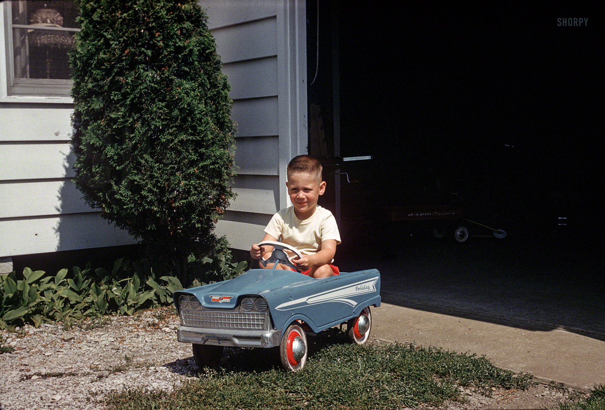 "11:45 a.m. 8-11-60. Jerry after haircut. f11 1/50." 35mm Kodachrome snagged on eBay for $3.99, photographer and location unknown. View full size.