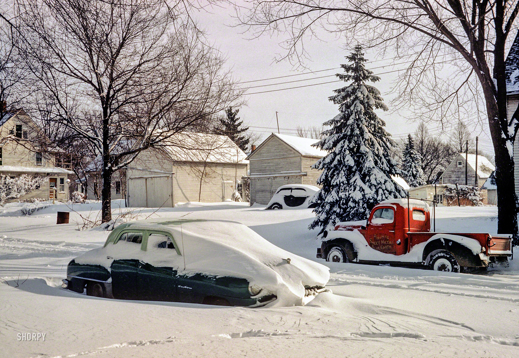 "Our new car in snow -- March 23, 1952." Hubert and Grace's green DeSoto stars in this latest episode of Minnesota Kodachromes. View full size.
