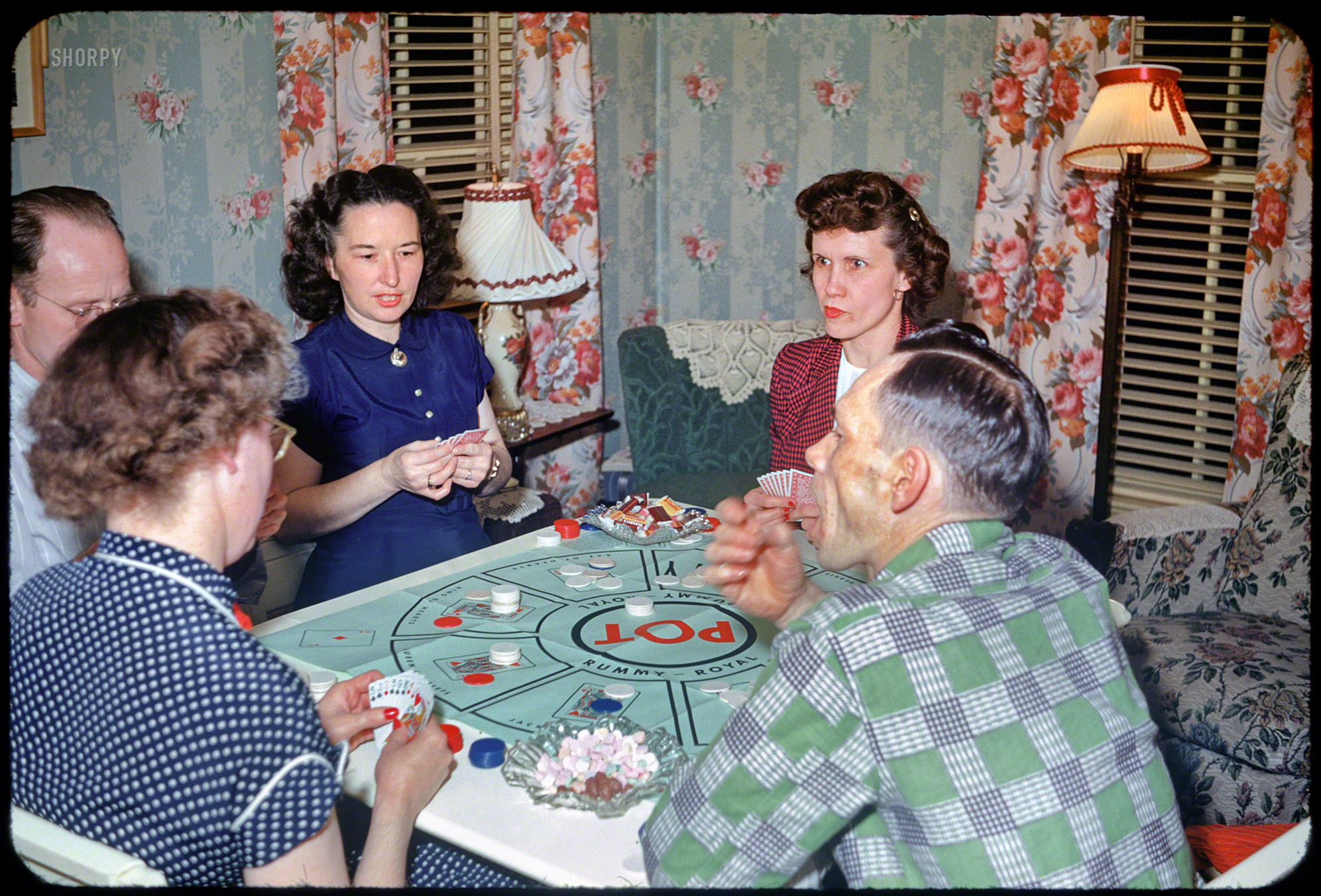"Card game at Floyd's -- Feb. 11, 1952." In this latest episode of Minnesota Kodachromes (or is it a Mama's Family prequel?) we have, going clockwise from lower left, Dottie, Ivan, Grace, Rach and Floyd playing Rummy Royal, with the empty chair belonging to Hubert, who took the picture. View full size.