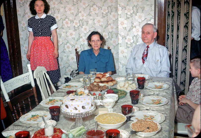 "Folks at 51st wedding anniversary - 17 Feb 1952." We return to Blue Earth, Minnesota, and the home of Abe and Julia Tuttle, parents of Hubert (behind the camera) and in-laws of the lovely Grace. Now, who'll have some of this delicious creamed corn? 35mm Kodachrome. View full size.
