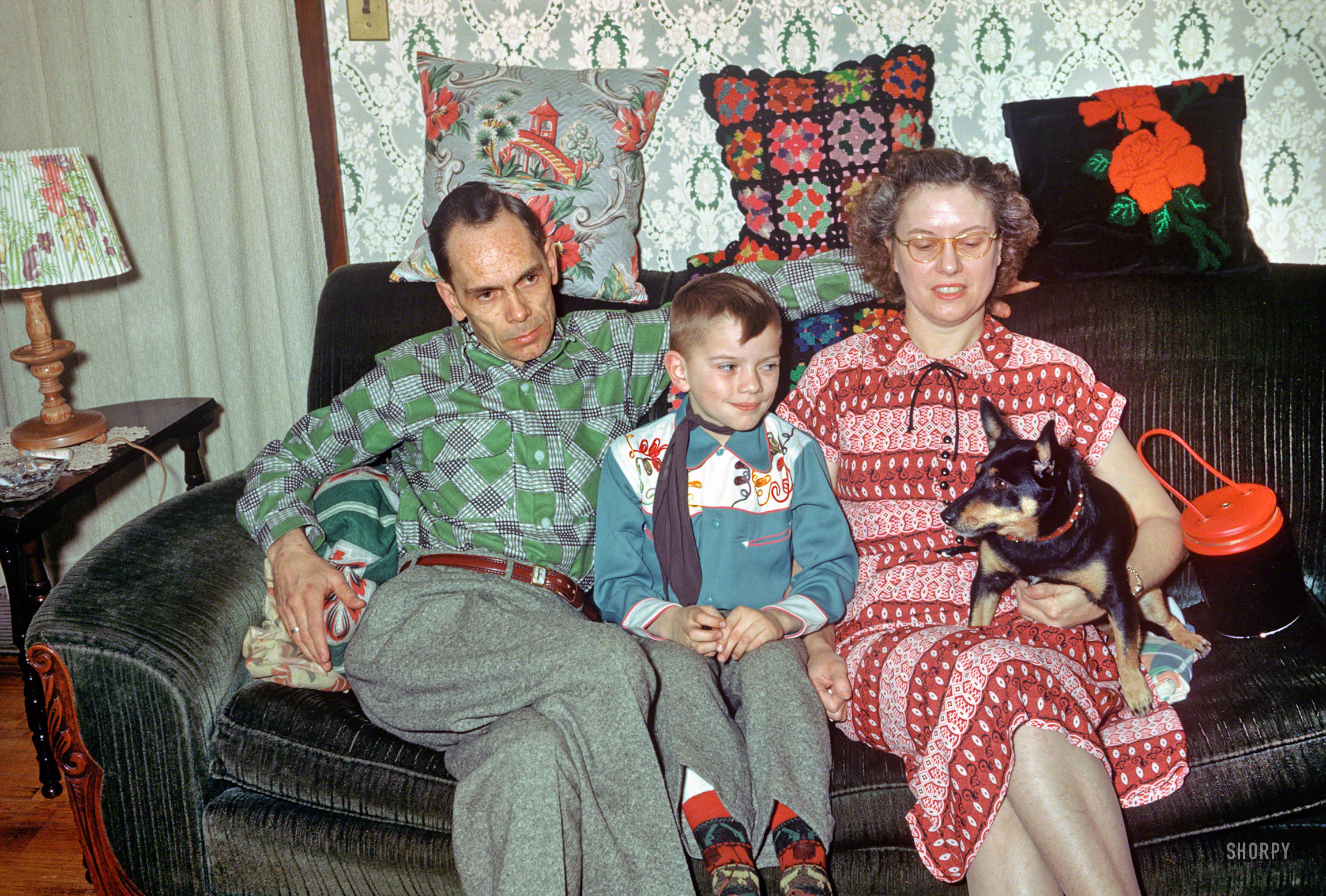 "Floyd, Loren, Dottie & Boots at Folks -- Jan 20 1952." From the shores of Lake Wobegon comes this latest installment of Minnesota Kodachromes. With Loren sporting six-gun sox. 35mm slide by Hubert Tuttle. View full size.