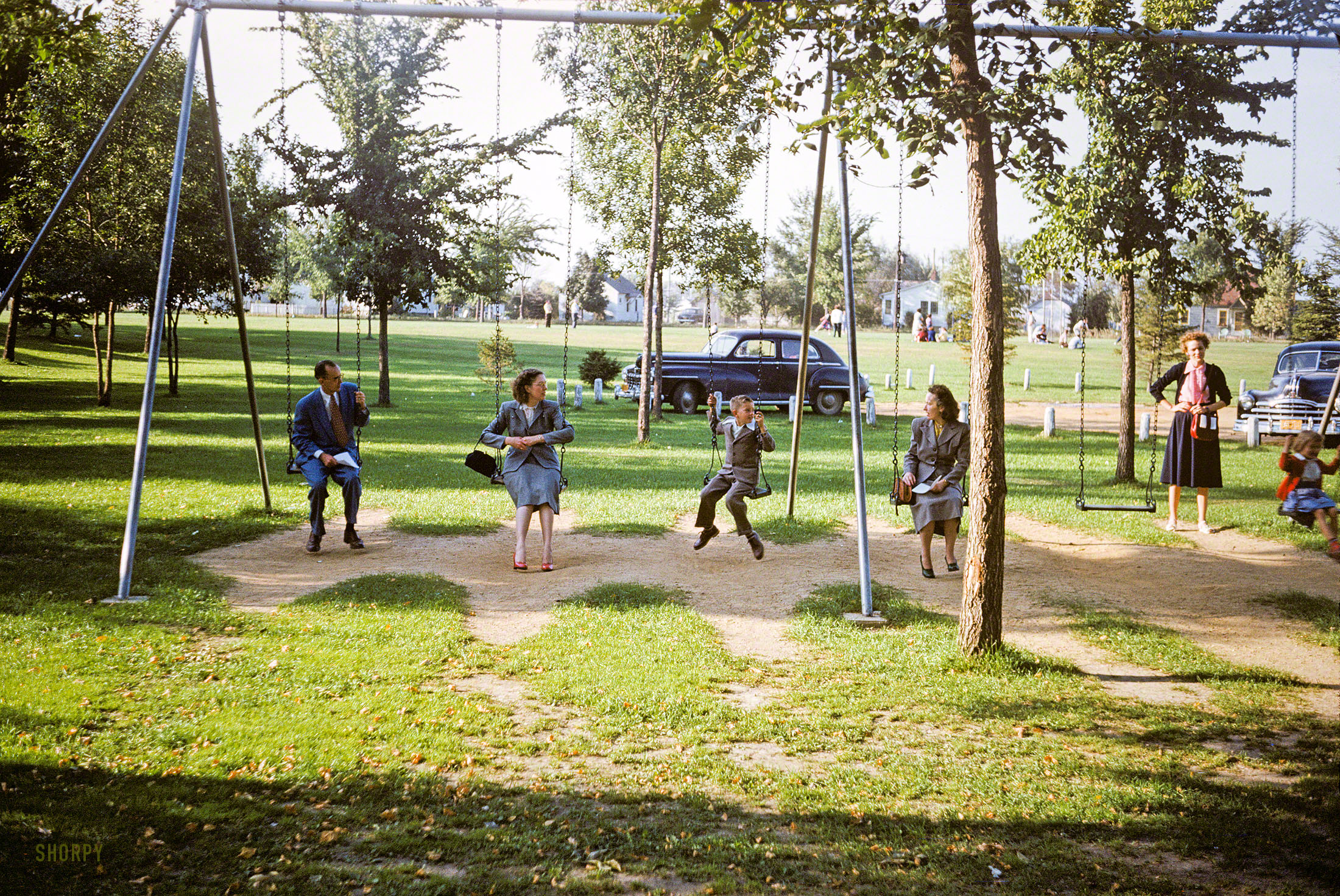 "7 Sept 1952. Picnic at Austin. Ivan, Dottie, Loren, Grace." A little cooldown after the sack race, maybe, in this latest installment of our popular new reality series Minnesota Kodachromes. 35mm color slide by Hubert Tuttle. View full size.