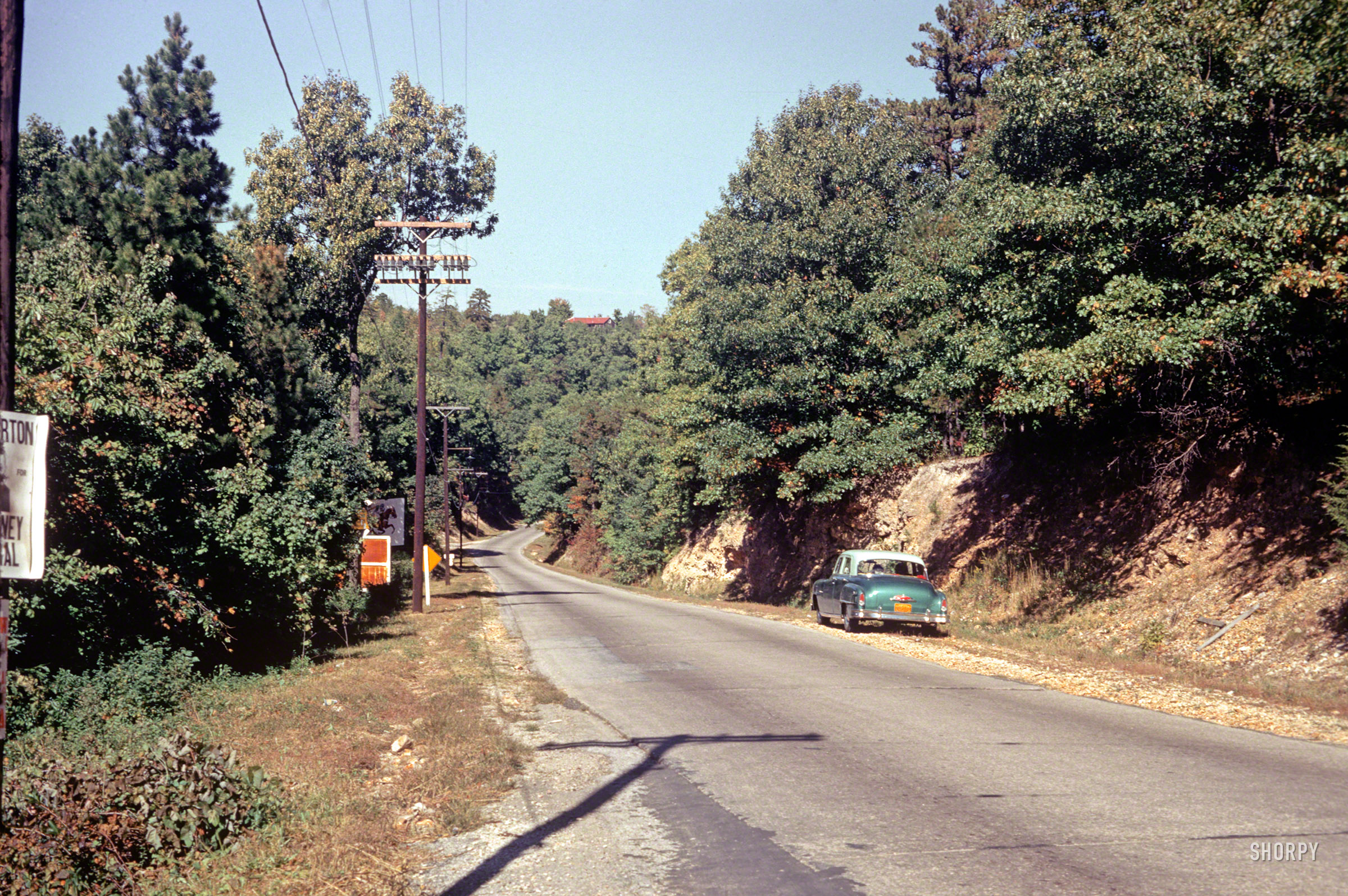 &nbsp; &nbsp; &nbsp; &nbsp; UPDATE: Shorpy member SteamBoomer has correctly identified the location as Eureka Springs, Arkansas. See the Comments for details.
"7 Oct. 1952 -- Entrance to ______&nbsp;  _______." Who can tell us where we are in this latest installment of Minnesota Kodachromes? (Hint: not Minnesota.) 35mm color slide by Hubert Tuttle, on the road with wife Grace. View full size.