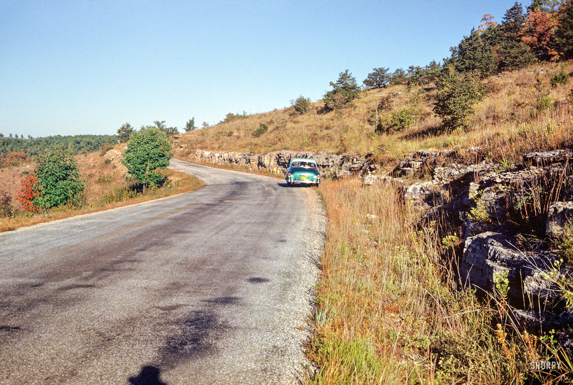 "Shepherd of the Hills Country - 7 Oct 1952." Hubert & Grace's DeSoto has a starring role in the latest "away" episode of Minnesota Kodachromes, parked somewhere near Branson, Missouri. Color slide by Hubert Tuttle. View full size.