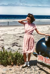 "Girl 1943" is all it says on this Kodachrome snapped by Navy photographer's mate Don Cox on a beach that would seem to be somewhere in the vicinity of San Diego. View full size.