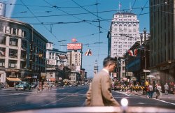 "San Francisco 1947" is the notation on this latest Kodachrome from Don Cox. Who, given the choice of shooting pedestrians or running them over, chooses the former. View full size.