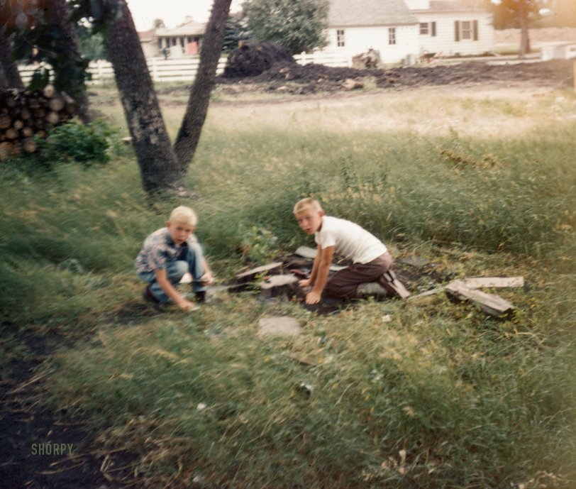 "Vern &amp; Mike 1955 Worthington" is all it says here. Whatever you boys are doing, stop it this instant! Blurry 35mm Kodachrome probably taken by Mom or Dad. View full size.
