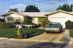 Today in the Shorpy Showcase of Random Kodachromes, a slide dated NOV 73. New Jersey Cadillac, South Florida house. Hurry up, Harry, or we'll be late for the Early Bird! View full size.
