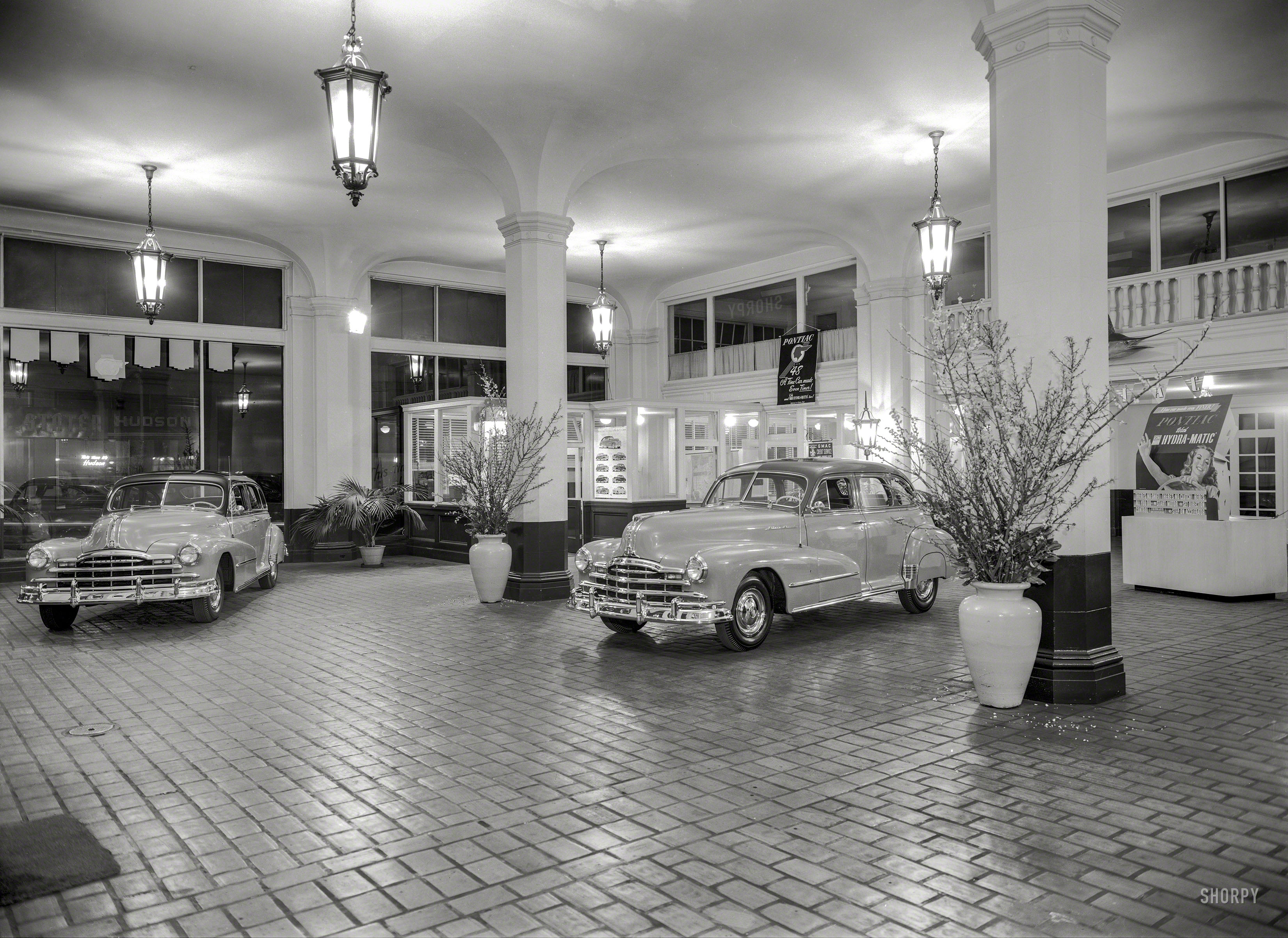 From San Francisco circa 1948 comes this nighttime shot of a Pontiac showroom, which our learned commenters reveal was at 1560 Van Ness Avenue. 8x10 inch Kodak safety negative, photographer unknown. View full size.