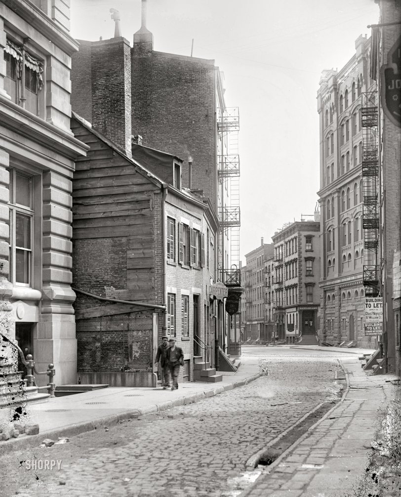 New York circa 1890s. "Street view, 21-23 Pearl Street." Glass negative by Robert L. Bracklow (1849-1919), a member of the Society of Amateur Photographers of New York. View full size.
