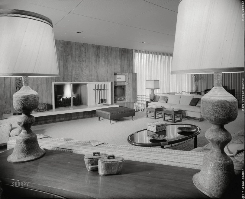 1956. "Hayes residence, Kessler Lake Drive, Dallas. Living room to fireplace. Architects: Prinz &amp; Brooks." Our second look at Chevrolet dealer Earl Hayes' midcentury manse with the tacky acoustic-tile ceiling. Photo by Maynard L. Parker for House Beautiful. Source: Huntington Library. View full size.
