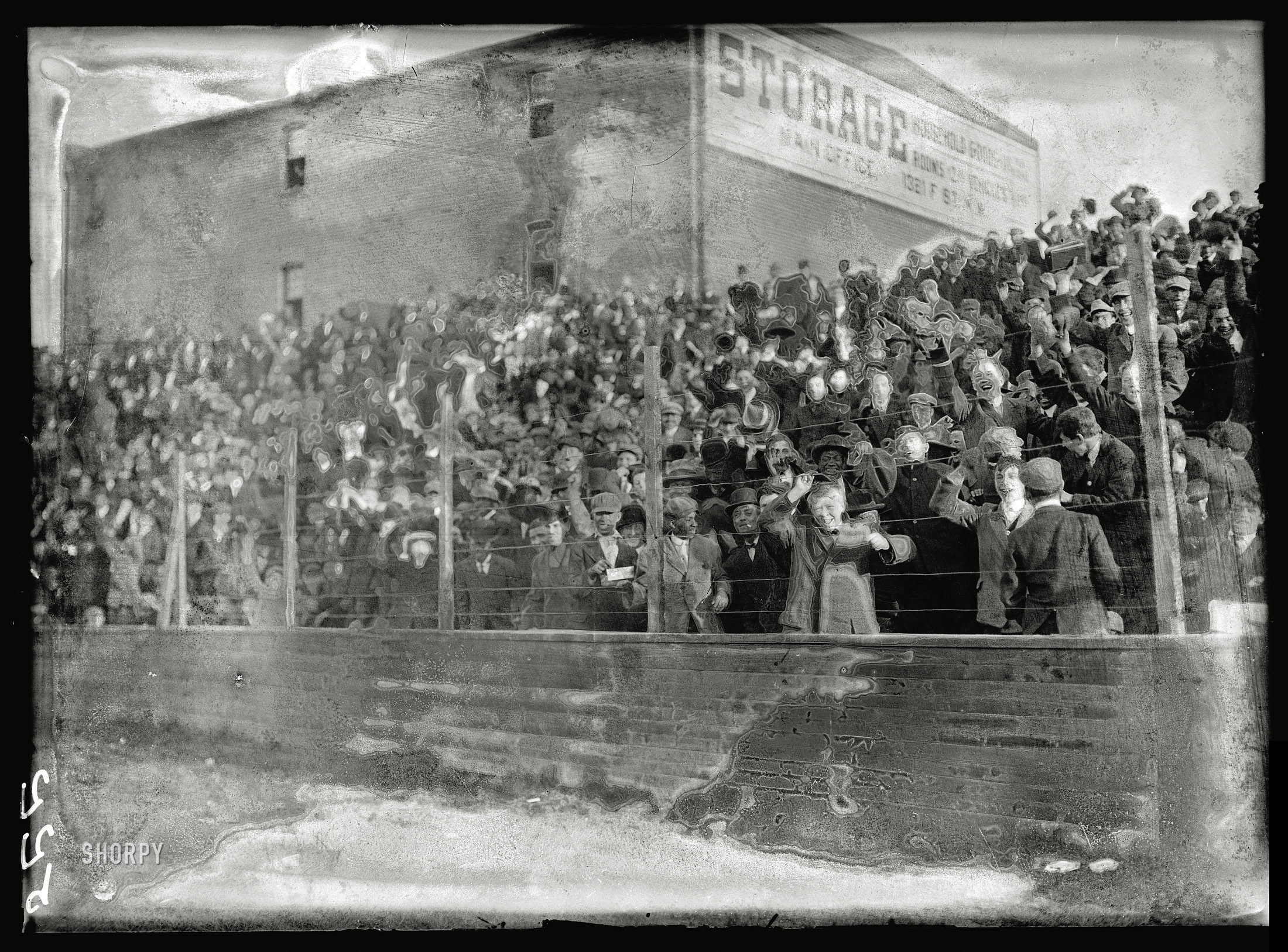 1911. Washington, D.C. "Professional baseball -- view during game." The unintentional artistic influences here range from Peter Max to Edvard Munch, thanks to mold on the emulsion. Harris & Ewing glass negative. View full size.