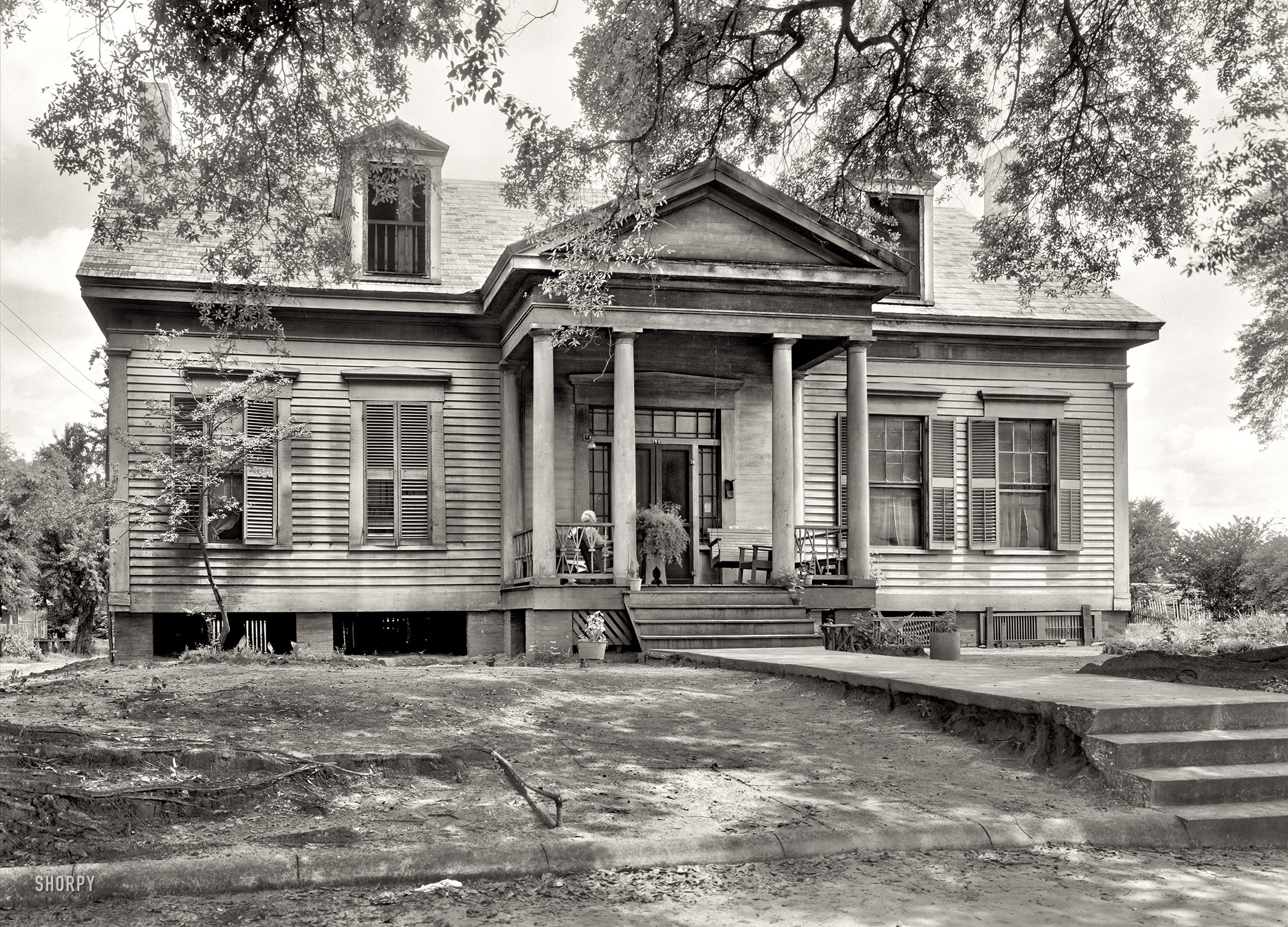 1939. "Purnell House, Jeff Davis Street, Selma, Dallas County, Alabama. Porch with colonnettes." Photo by Frances Benjamin Johnston. View full size.