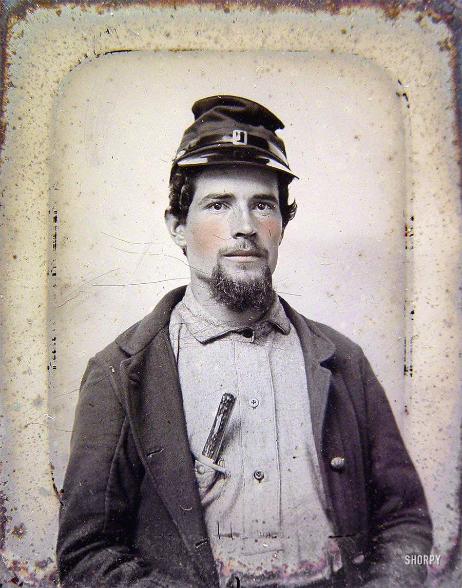 Ca. 1863. "Unidentified soldier in Union uniform with forage cap carrying a bone handle knife in breast pocket." Sixth-plate tintype, hand-colored. Liljenquist Family Collection of Civil War Photographs, Library of Congress. View full size.