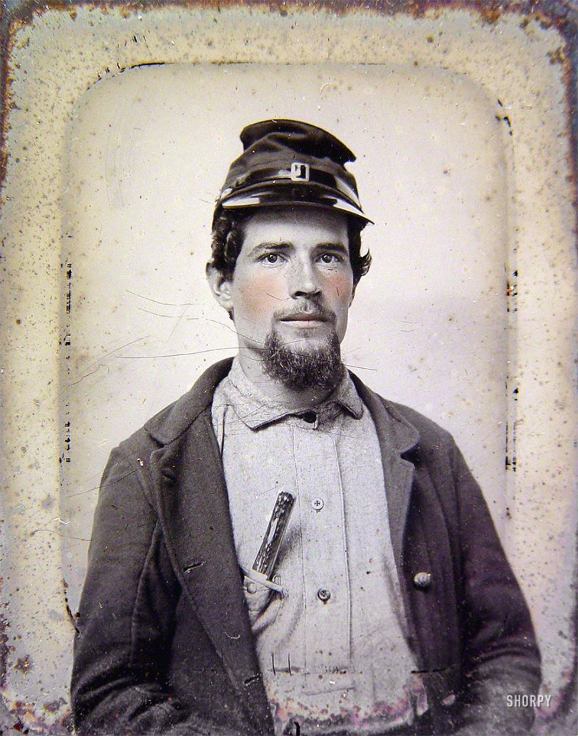 Ca. 1863. "Unidentified soldier in Union uniform with forage cap carrying a bone handle knife in breast pocket." Sixth-plate tintype, hand-colored. Liljenquist Family Collection of Civil War Photographs, Library of Congress. View full size.
