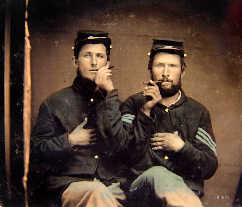 Guys gone wild, 1860s style. "Unidentified soldiers in Union uniforms holding cigars in each other's mouths." Ninth-plate tintype, hand-colored. Liljenquist Family Collection of Civil War Photographs, Library of Congress. View full size.
