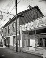 Florida circa 1936. "Watkins House, 52 St. George Street, St. Augustine." Keeping company with the Rogolino Dress Shop and its curiously draped display. 8x10 inch acetate negative by Frances Benjamin Johnston. View full size.