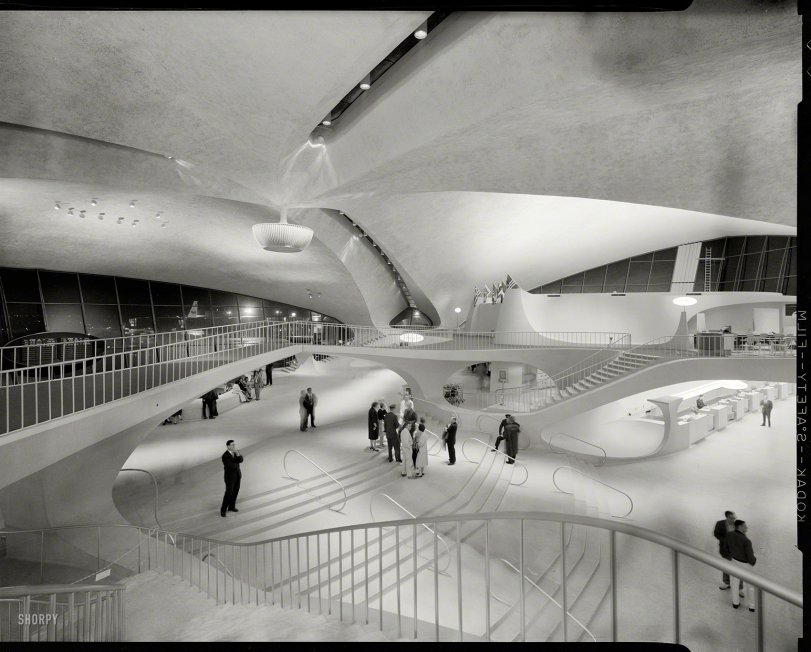 Queens, New York, 1964. "Trans World Airlines Terminal, John F. Kennedy (Idlewild) Airport, 1956-62. Eero Saarinen, architect." Back before air travel turned into a bus trip with X-rays. Photo by Balthazar Korab. View full size.
