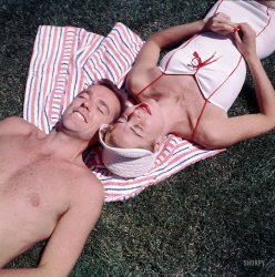 Las Vegas, 1953. "Dancers Marge and Gower Champion sunbathing by the swimming pool at the Flamingo Hotel." Photo by Maurice Terrell for the Look magazine article "The Champions Cut a Wet Rug." View full size.