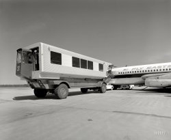 A more complete view of the "mobile lounge" whose gangway was seen here yesterday. "Dulles International Airport, Chantilly, Virginia, 1958-63. Eero Saarinen, architect. Mobile lounges." Photo by Balthazar Korab. View full size.