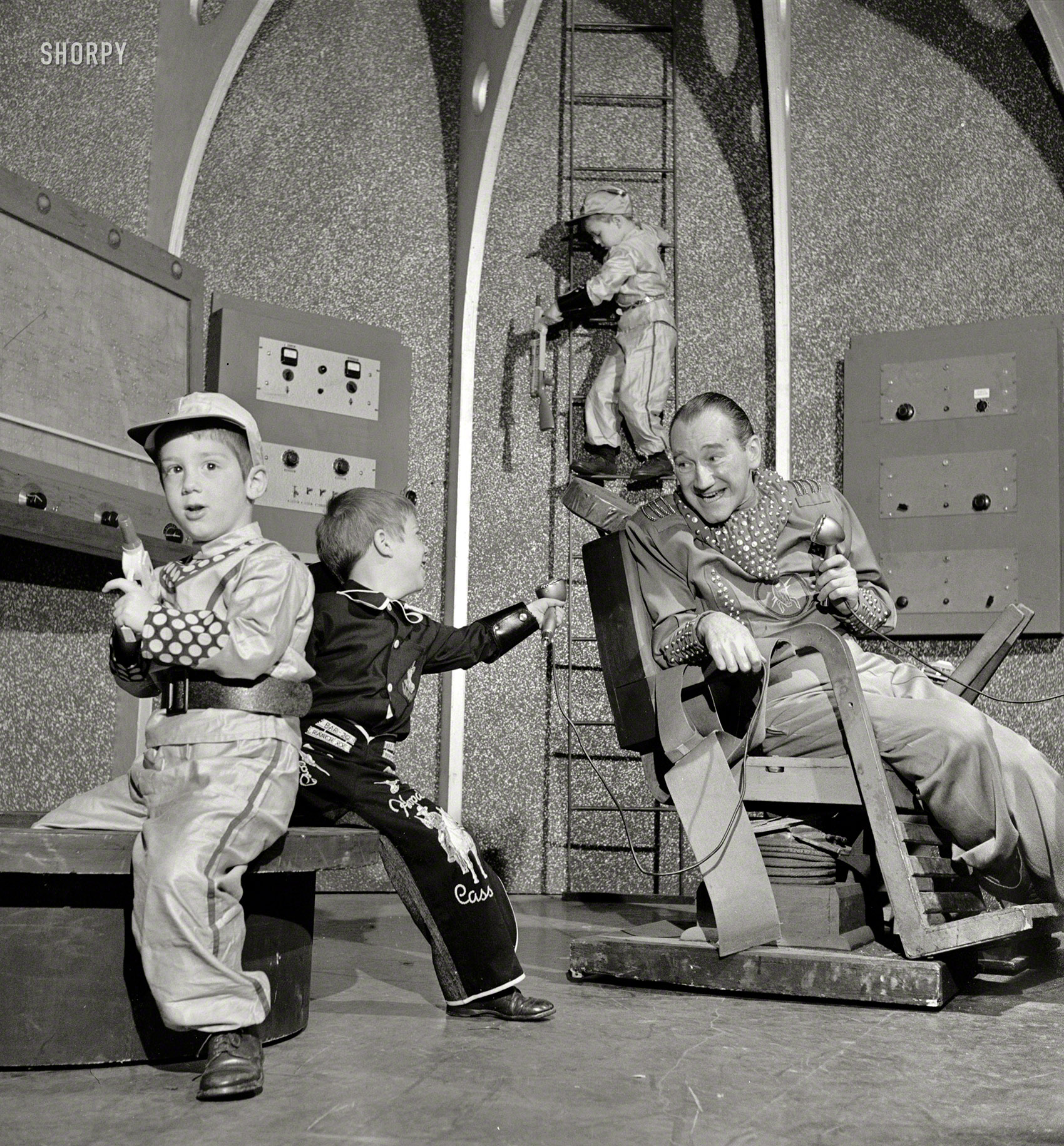 From 1952 comes this conflation of two popular genres in the children's TV show "Tom Corbett, Space Cadet." Photo by Charlotte Brooks for the Look magazine assignment "Cowboys and Meteors." View full size.