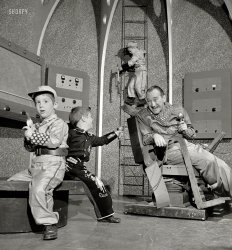 From 1952 comes this conflation of two popular genres in the children's TV show "Tom Corbett, Space Cadet." Photo by Charlotte Brooks for the Look magazine assignment "Cowboys and Meteors." View full size.