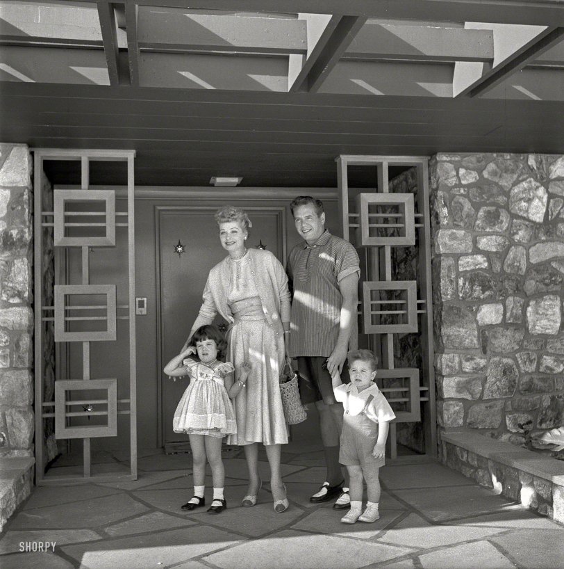1954. "Actress Lucille Ball and husband Desi Arnaz with children Desi Jr. and Lucie in front of their Palm Springs home." Photo by Maurice Terrell for the Look magazine assignment "Lucy Goes Shopping." View full size.
