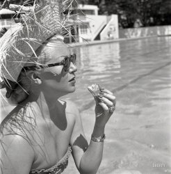 &nbsp; &nbsp; &nbsp; &nbsp; Lana Turner as shot for Look magazine. Which was, basically, an imitation of Life.
June 1951. "Actress Lana Turner lunching poolside at the Coral Casino in Santa Barbara, Calif." From photos by Earl Theisen for Look magazine. View full size.