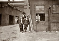 November 1909. "These boys work off and on in Cumberland Glass Works, Bridgeton, N.J. Smallest boy is George Cartwright, 401 N. Laurel Street. He says been working off and on since 11 years old." Photo by Lewis Hine. View full size.