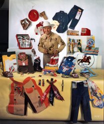 October 1949. "Cowboy entertainer Gene Autry posing with children's clothing and toys which have his name and/or image on them." Kodachrome from photos by Frank Bauman and Stanley Kubrick for Look magazine. View full size.