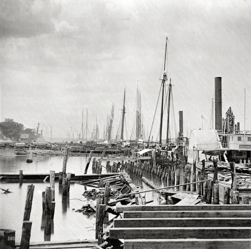 Circa 1865. "City Point, Virginia. Unloading Federal supplies from transports." Civil War glass negative collection, Library of Congress. View full size.
