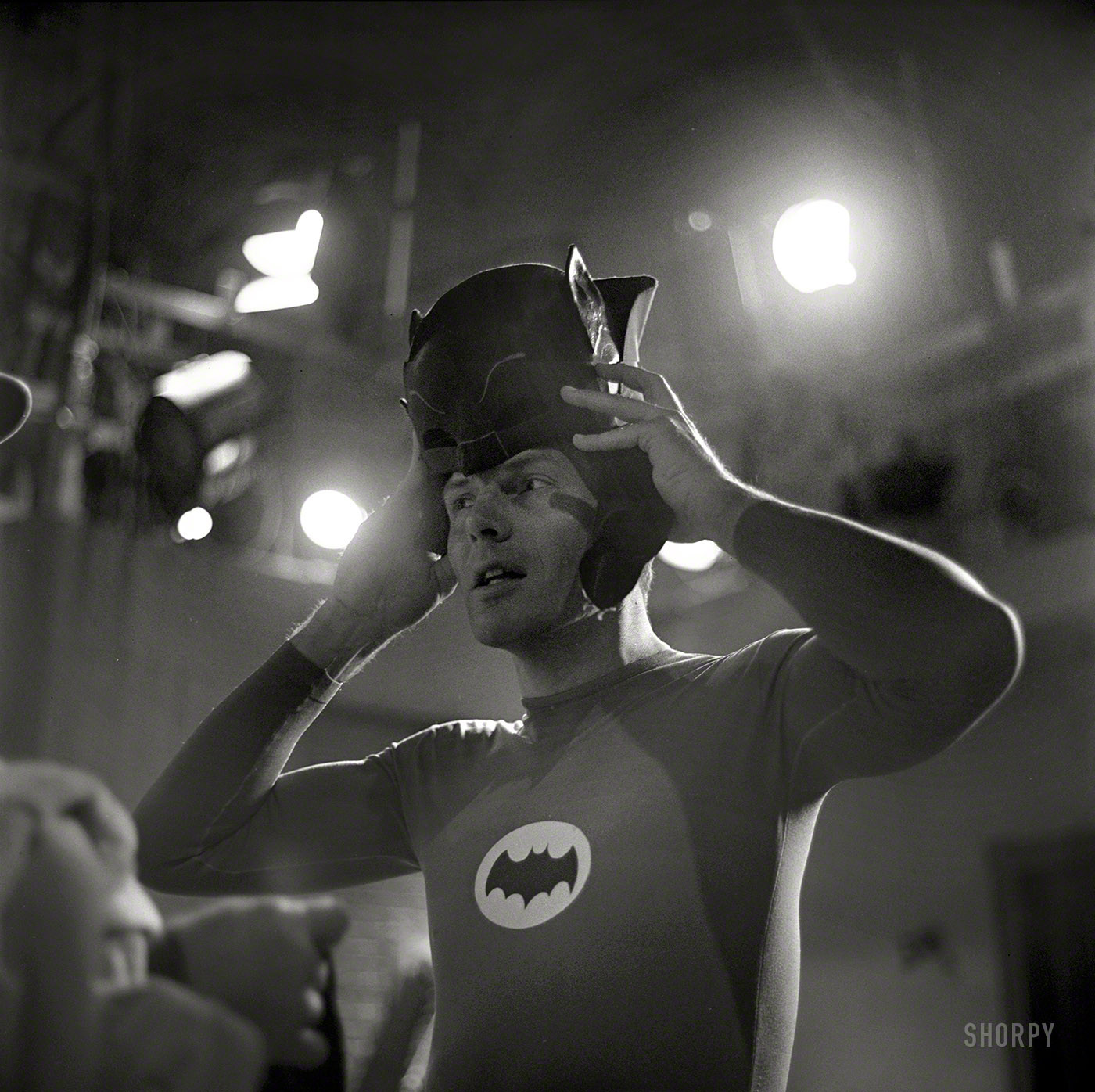 Adam West on the set of the movie "Batman" in 1966. From a series of photos taken by Richard Hewett for Look magazine. View full size.
