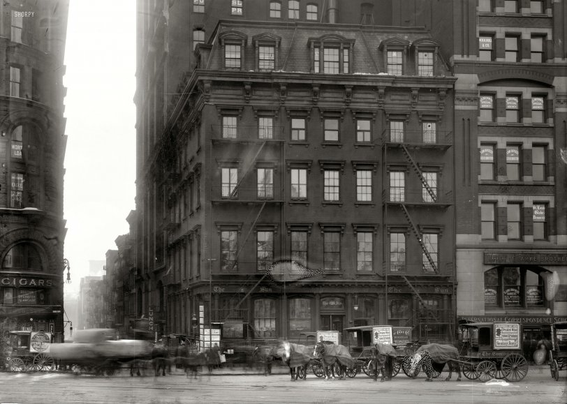 Photo of: The Sun: 1914 -- The Sun newspaper building on New York's Park Row circa 1914. View full size. 8x10 glass negative, Geo. Grantham Bain Collection. Who can ID the cross street?