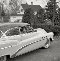 1953. "Comedienne Martha Raye at her home in Connecticut." In a Buick Super whose grille rivaled her own. Photo by Douglas Jones for the Look magazine article "Martha Raye: At Home, She's Quieter." View full size.