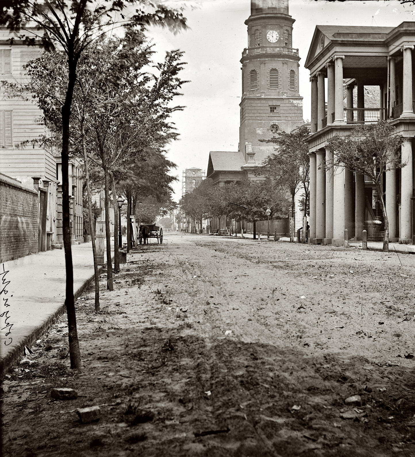 1865. "Charleston, South Carolina. Meeting Street, near Broad; St. Michael's Church in middle distance. Photograph of the Federal Navy, and seaborne expeditions against the Atlantic Coast of the Confederacy." View full size. Left half of a wet-collodion glass-plate stereograph. Juniper Gallery fine-art print.