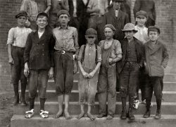 "Photos taken during noon hour, October 23rd, 1912, at the Loray Mills, Gastonia, N.C. They said they were working and went in to work. At night I counted over thirty children coming out when the whistle blew, and they seemed to be from ten to twelve years old. The Superintendent was much disturbed over the photos." Photograph and caption by Lewis Wickes Hine. View full size.