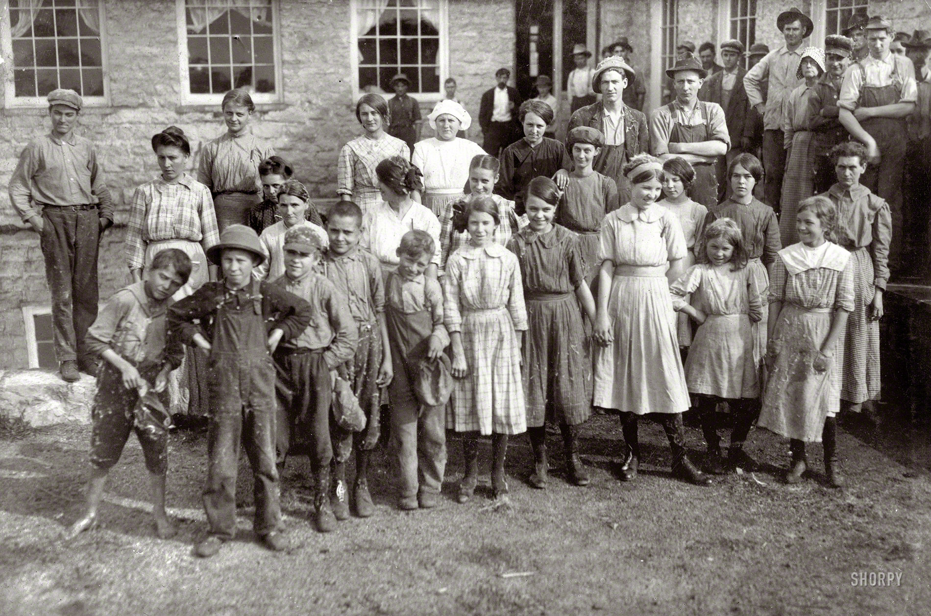 December 1913. "The whole force of workers in the cotton mills of Stevenson, Ala. Several of them are apparently under twelve, but could not get the ages. Photo posed by the general manager." Photo by Lewis Wickes Hine. View full size.