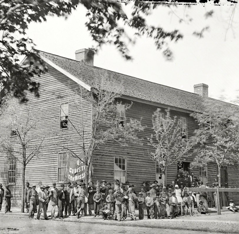 April 1865. "Richmond, Va. Crowd before headquarters of the U.S. Christian Commission." An offshoot of the YMCA that provided medical and spiritual support to Union troops during the Civil War. Wet plate negative. View full size.
