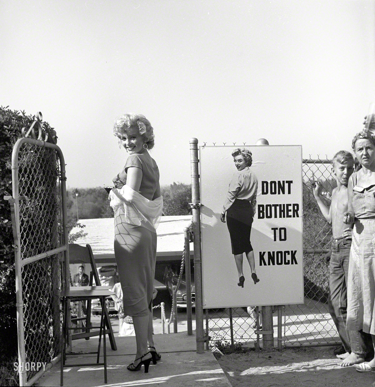 August 1952. Los Angeles. "Marilyn Monroe attending a publicity event for the film Don't Bother to Knock." Photo by Earl Theisen for Look magazine. View full size.