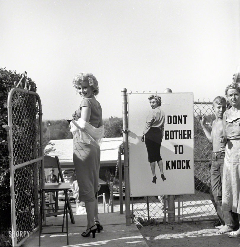 August 1952. Los Angeles. "Marilyn Monroe attending a publicity event for the film Don't Bother to Knock." Photo by Earl Theisen for Look magazine. View full size.
