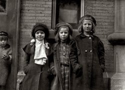March 1909. Hartford, Conn. "Newsgirls waiting for papers. Largest girl, Alice Goldman, has been selling for 4 years. Newsdealer says she uses viler language than the newsboys do. Bessie Goldman and Bessie Brownstein are 9 years old and have been selling about one year. All sell until 7 or 7:30 p.m." Photo by Lewis Wickes Hine for the National Child Labor Committee. View full size.