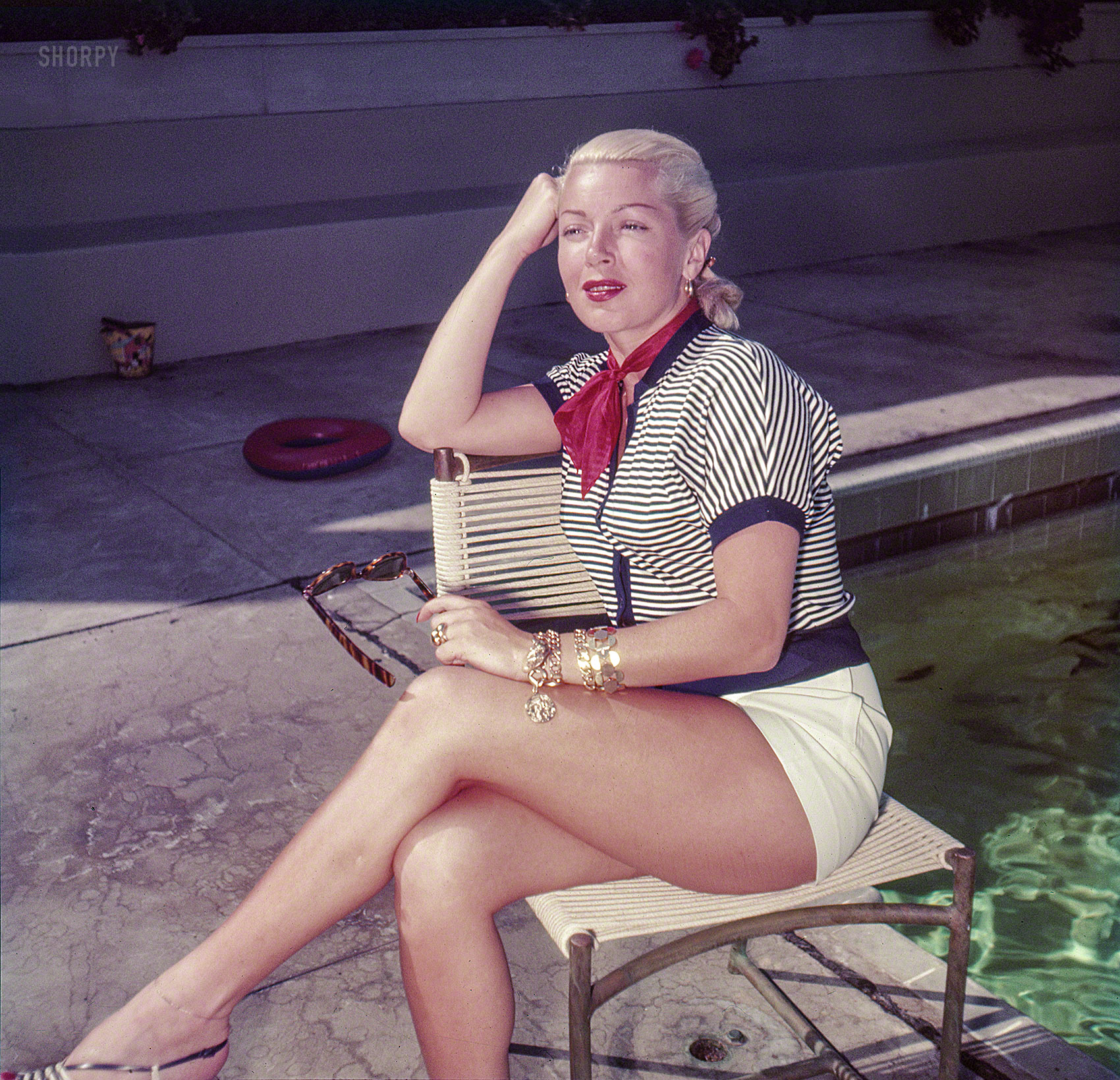 1951. Santa Barbara, California. "Lana Turner by pool at the Coral Casino." Color transparency by Earl Theisen for Look magazine. View full size.